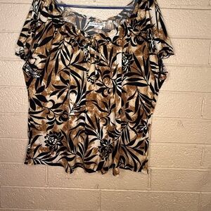 Claudia Richard Tan and Black Patterned Dress